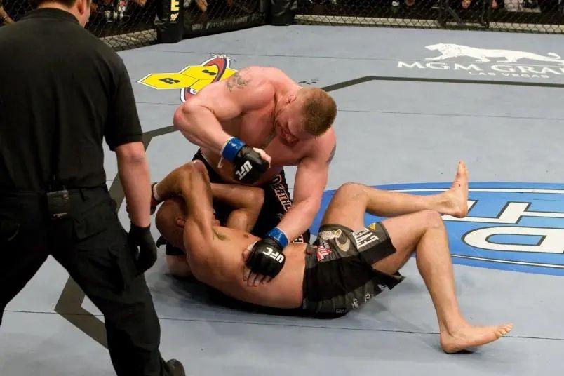 Brock Lesnar finishing Randy Couture with strikes on the ground. Credits to: Josh Hedges - Zuffa LLC.