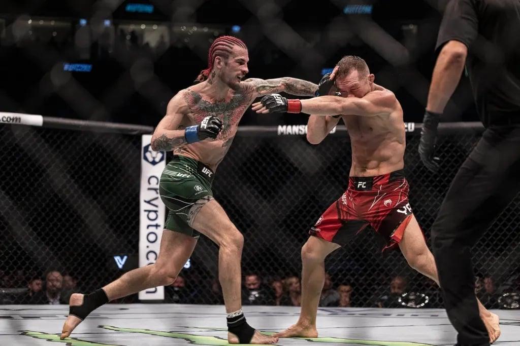 Sean O'Malley cracking Petr Yan with a left hand at UFC 280. Credits to: Craig Kidwell - USA TODAY Sports.
