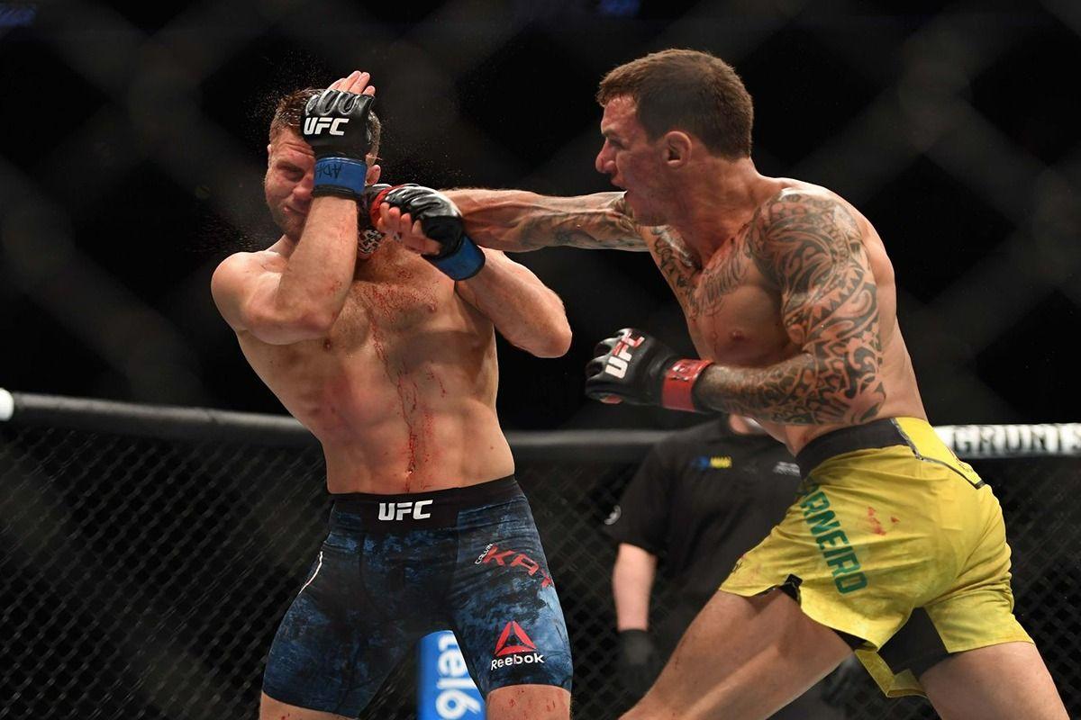 Renato Moicano lands a stiff right on Calvin Kattar. Credit: MMA Mania.