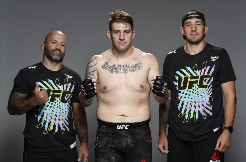 Chris (middle) and Kyle (right) Daukaus after one of Chris' wins. Photo by UFC.