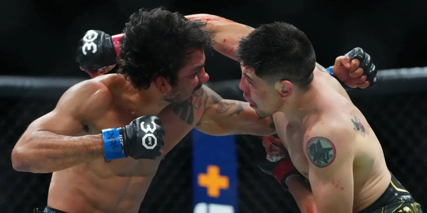 Brandon Moreno going to war with Alexandre Pantoja at UFC 290: Volkanovski vs. Rodriguez. Credits to: Stephen R. Sylvanie - USA TODAY Sports.
