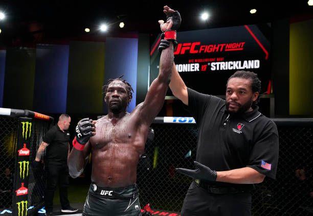 Jared Cannonier getting his hand raised after defeating Sean Strickland. Credits to: Chris Unger-Zuffa LLC.