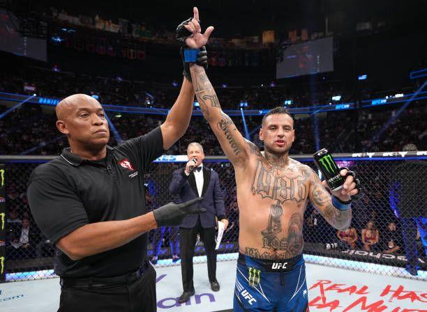 Daniel Rodriguez getting his hand raised after defeating Li Jingliang at UFC 279. Credits to: Jeff Bottari-Zuffa LLC.