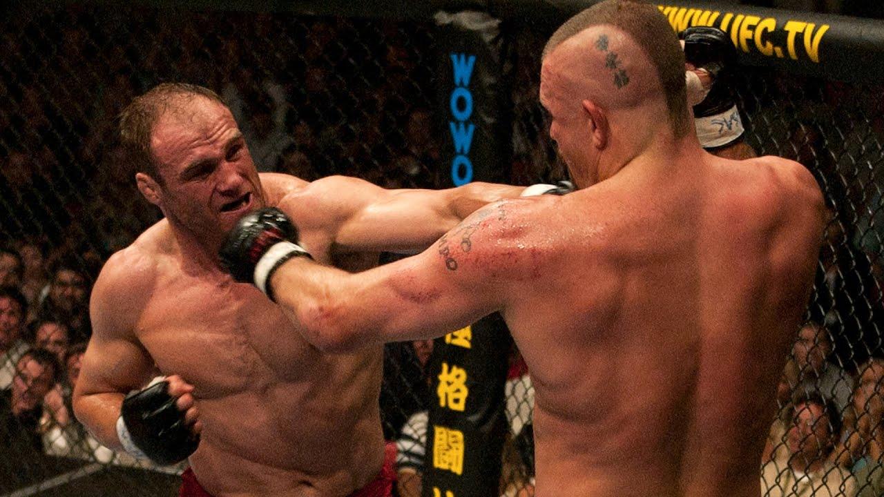 Randy Couture and Chuck Liddell during their fight at UFC 43. Credits to: UFC - YouTube.