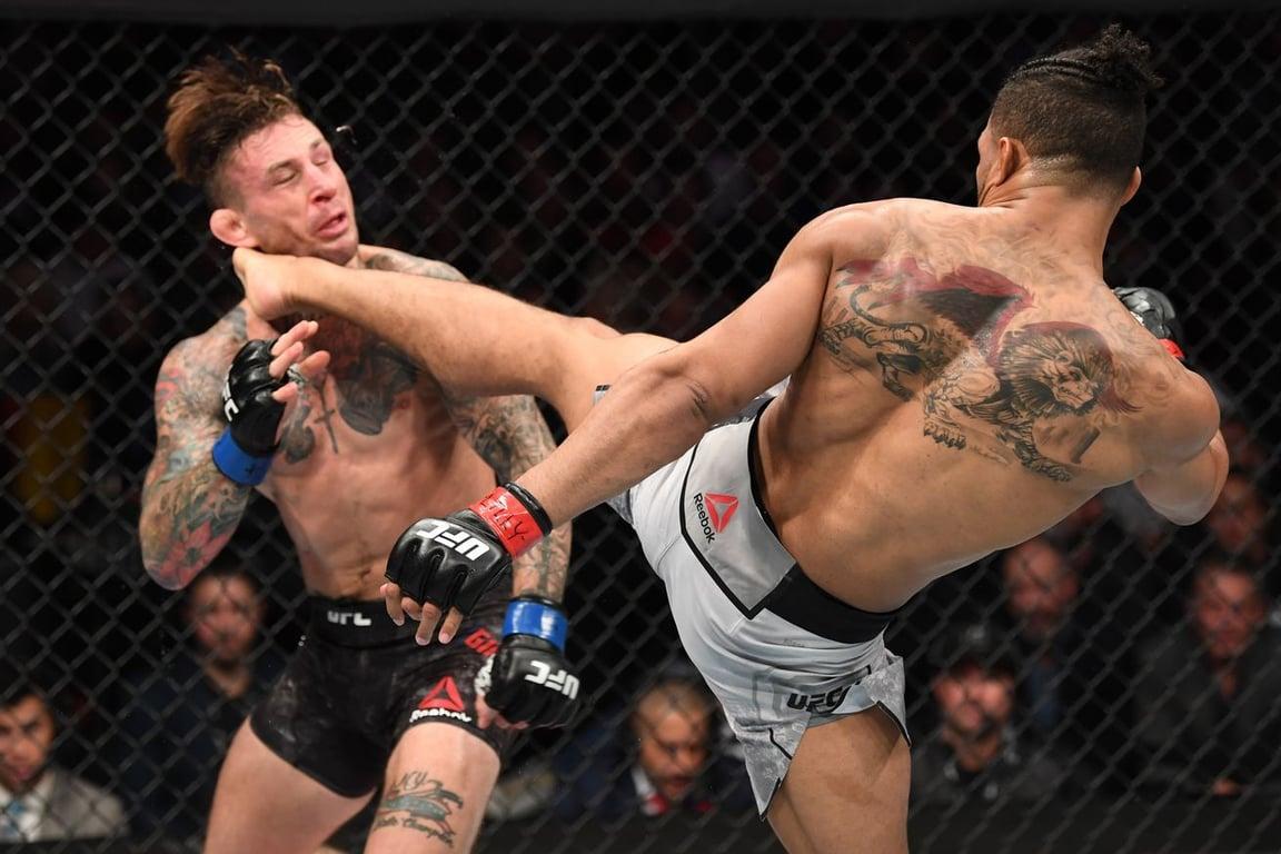 Kevin Lee securing a lethal headkick knockout against Gregor Gillespie at UFC 244. Credits to: Brent Brookhouse - CBS Sports.