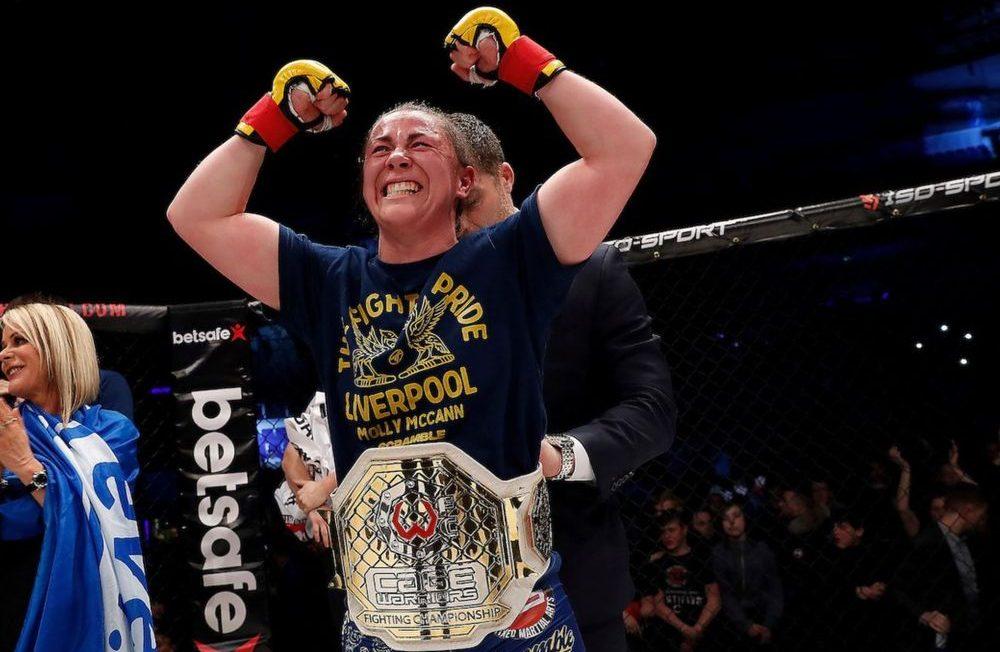 Molly McCann celebrating a Championship win in Cage Warriors. Credits to: Dolly Clew-Cage Warriors.