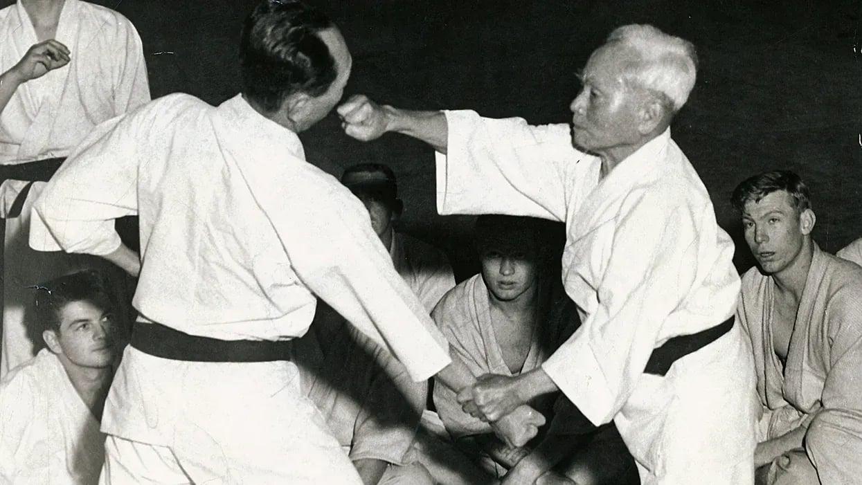 Gichin Funakoshi teaching a Karate class.