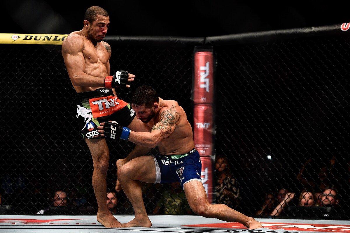 Jose Aldo lands a knee to the head of Chad Mendes. Credit: Washington Post.