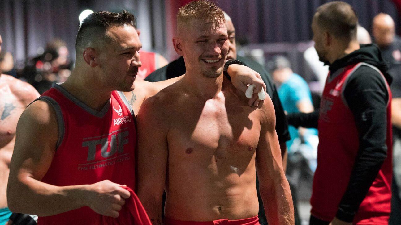 Michael Chandler and Austin Hubbard celebrating their victory: Credits to: ESPN - Andres Waters.