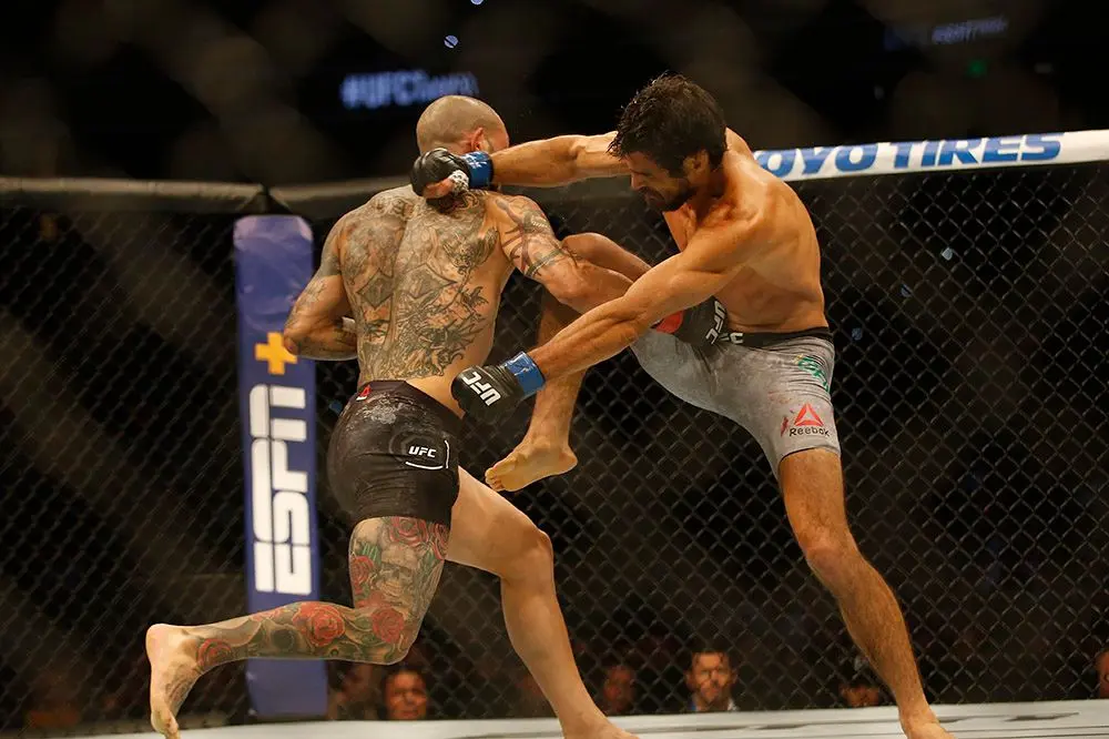 Kron Gracie and Cub Swanson in their Fight of The Night bout. Credits to: Reinhold Matay - USA TODAY Sports.