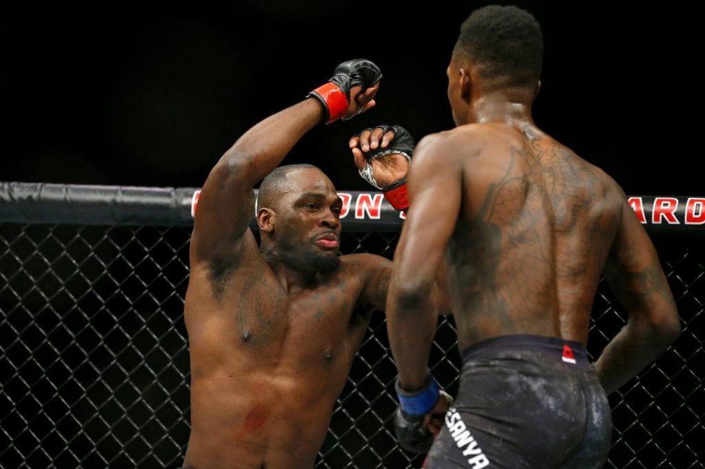 Israel Adesanya stings Derek Brunson with a left hand. Credits to: Noah K. Murray for USA TODAY Sports