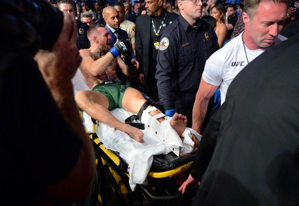 Conor McGregor after suffering his leg break at UFC 264. Credits to: Gary A. Vasquez - USA TODAY Sports.