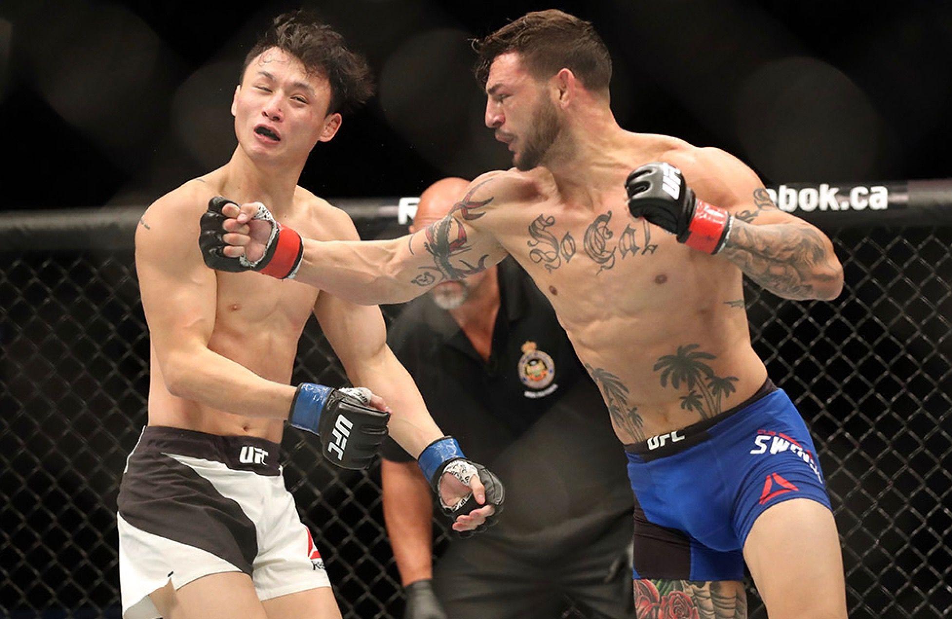 Cub Swanson lands a powerful blow against Doo-Ho Choi in 2016's fight of the year. Credits to: Tom Szczerbowski-USA TODAY Sports