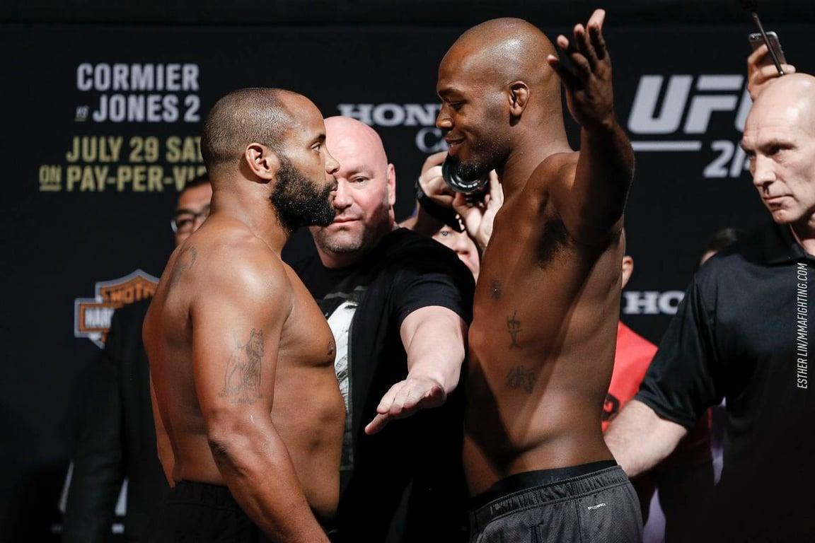 Jon Jones and Daniel Cormier face off at UFC 214 weigh ins. Credits to: Esther Lin/MMA Fighting