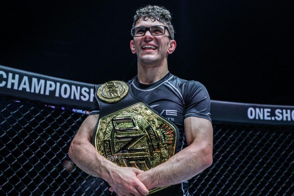Mikey Musumeci clutching his ONE Submission Grappling Championship. Credits to: ONE Championship.