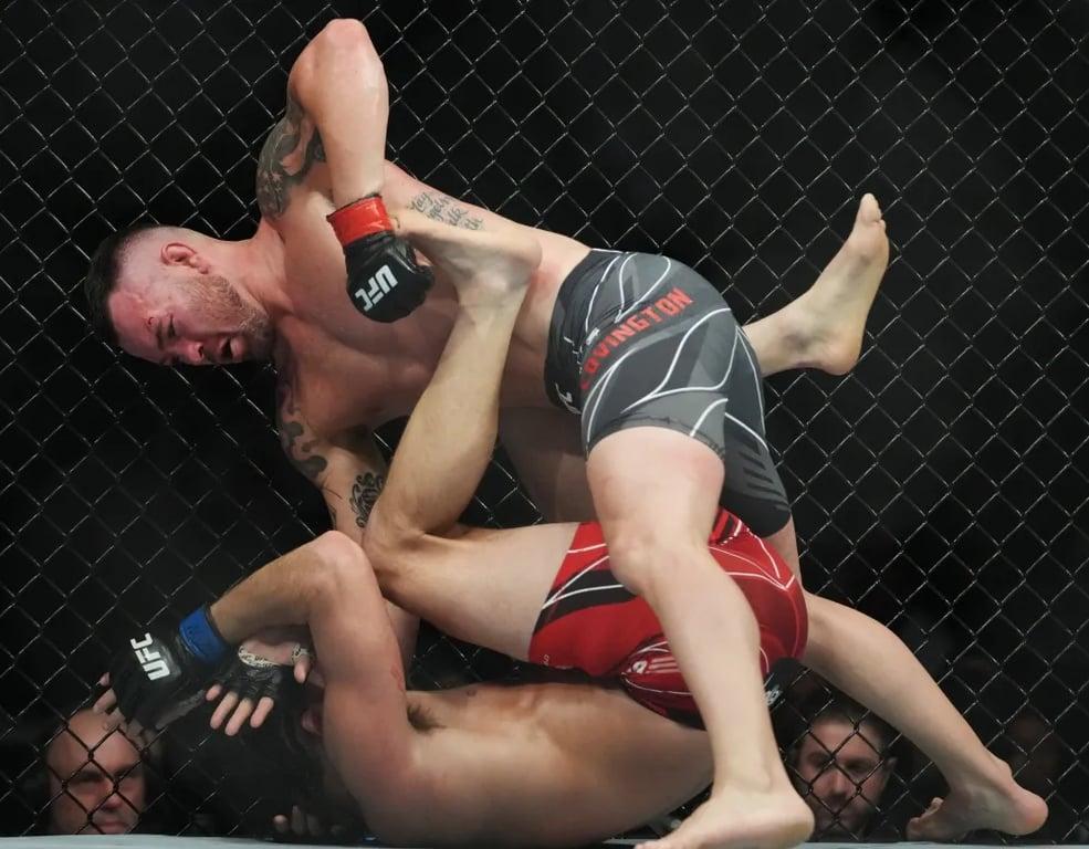 Colby Covington beating Jorge Masvidal with his wrestling at UFC 272. Credits to: Stephen R. Sylvanie - USA TODAY Sports.