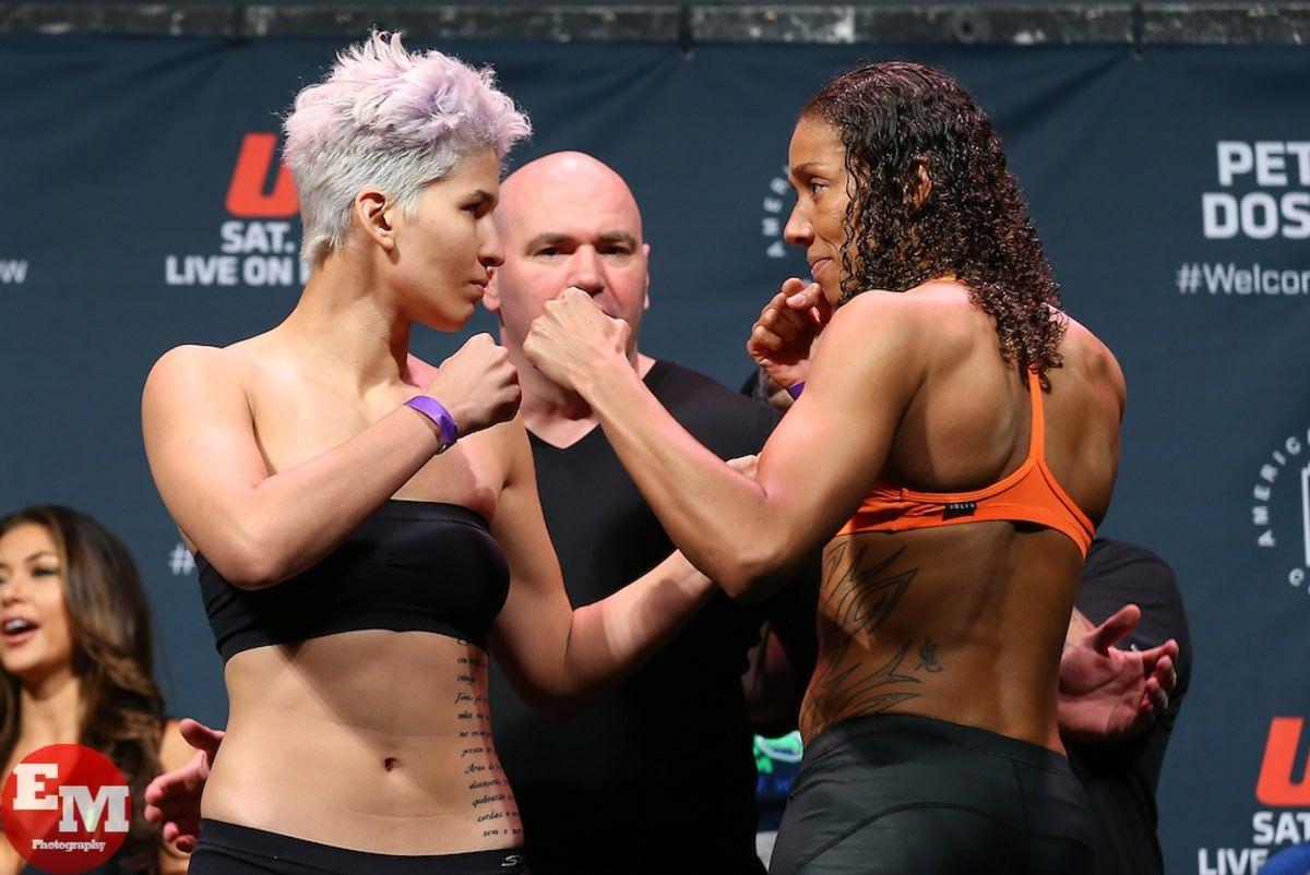 Larissa Pacheco in her faceoff against Germaine de Randamie. Pacheco was sporting a different hairstyle at the time; 'I used to do all of that crazy stuff when I was younger – maybe I’ll go green next like the color of the dollar. Maybe I’ll make a poll online and have the people vote for it,' said Pacheco. Photo by Josh Hedges, Zuffa LLC.