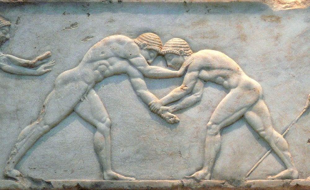 Ancient artwork depicting wrestling in Athens. Credit:  Wikimedia Commons/Fingalo.