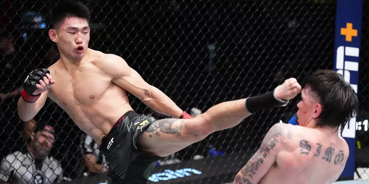 Song Yadong throwing a high-kick against Ricky Simón in his second UFC main event. Credits to: Jeff Bottari - Zuffa LLC.