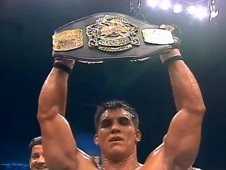 Frank Shamrock raising the Light-Heavyweight title. Credits to: T.P Grant - Bloody Elbow.