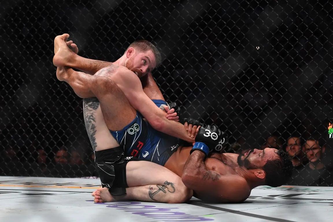Cory Sandhagen outgrappling Rob Font in his last matchup. Credits to: Christopher Hanewincke l- USA TODAY Sports.