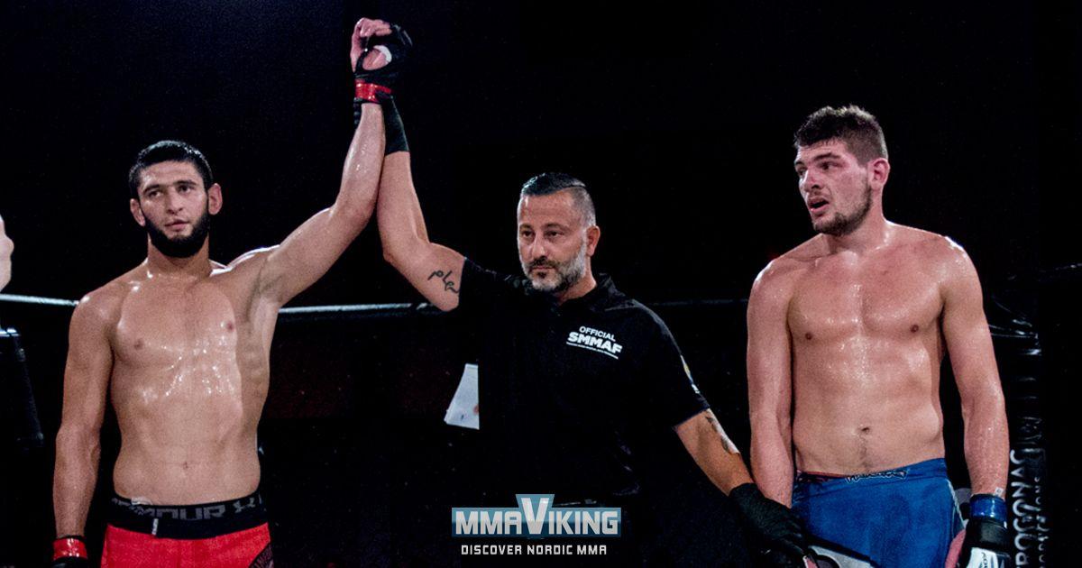 Khamzat Chimaev with his hand raised in his 2nd professional fight - MMA Viking
