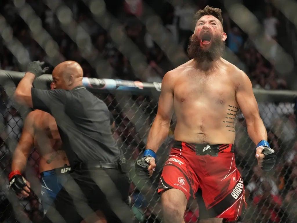 Bryan Barberena celebrating his win against Robbie Lawler. Credits to: Stephen R. Sylvanie-USA TODAY Sports.
